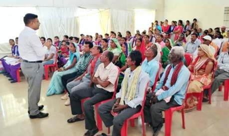 MD & CEO Pawan Agrawal counselling beneficiaries and their parents